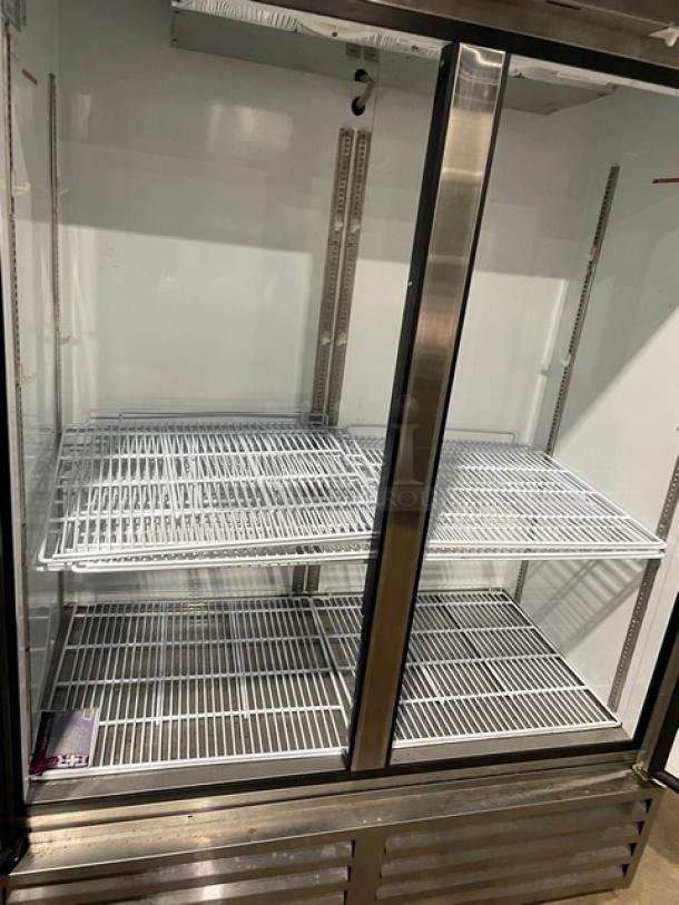 Beverage-Air stainless steel 2-door reach-in freezer, model KF48-1AS, with poly-coated wire rack, 115V 1 phase, SN: 9025789.