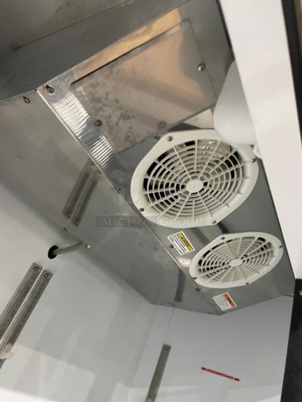 Beverage-Air KF48-1AS stainless steel 2-door reach-in freezer interior, showing poly-coated wired rack and fans.