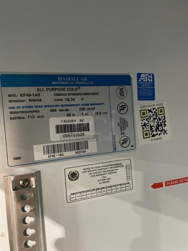 Beverage-Air model KF48-1AS sticker on a commercial freezer showing specifications and serial number.