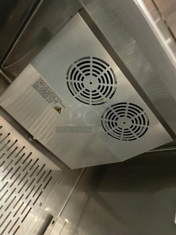 U-Star commercial stainless steel single door reach-in freezer, model USFZ-1D, with internal fans and wire rack, on casters.