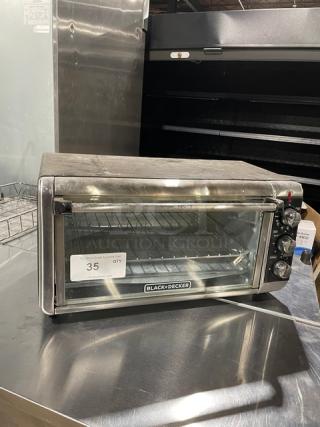 BLACK+DECKER TO3250XSB countertop convection toaster oven in stainless steel. Extra wide, on legs, 120V, used condition.