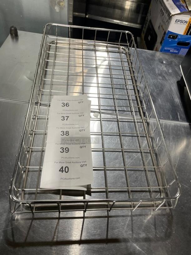 Commercial chrome-plated full-size wired rack for bagels/pastries, in good condition, with multiple auction tags.
