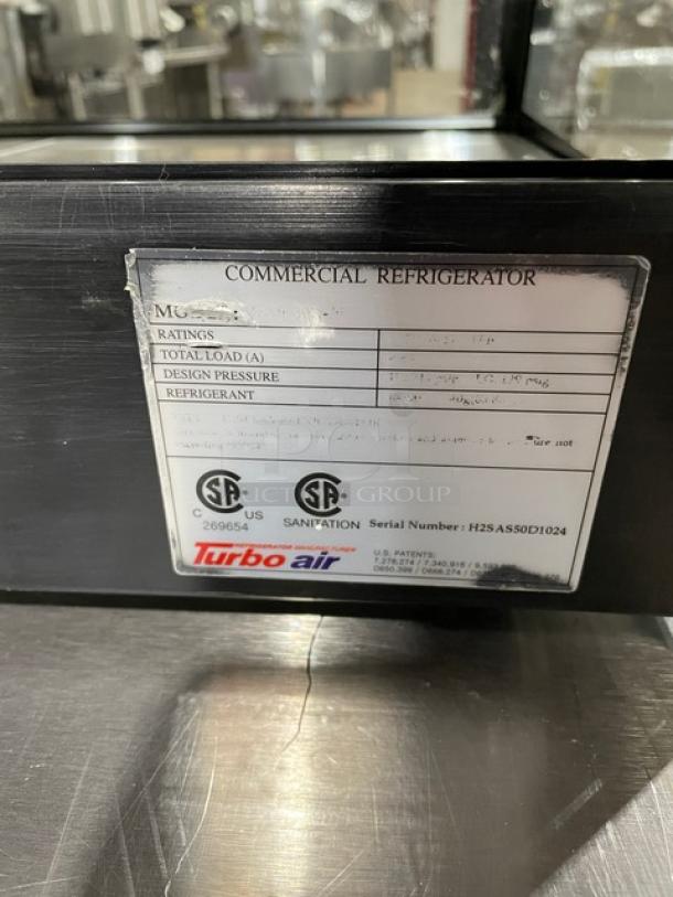 Turbo Air commercial black refrigerated countertop sushi merchandiser with stainless steel interior, rear sliding doors. SN: H2SAS50D1024.