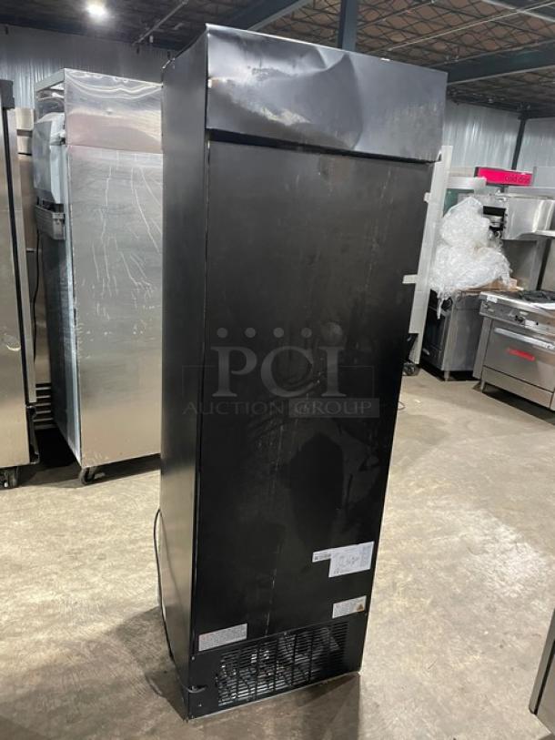 Avantco Commercial Black Single Glass Swing Door Reach-In Merchandiser Refrigerator, Model 178GDC15HCB, with LED lighting and poly-coated wire rack. Visible wear on exterior.