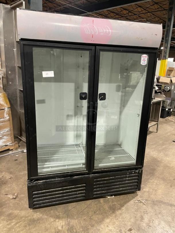 True Coco-Cola style black double glass door merchandiser refrigerator, model GDM-49, poly coated wire rack, 115V, used.