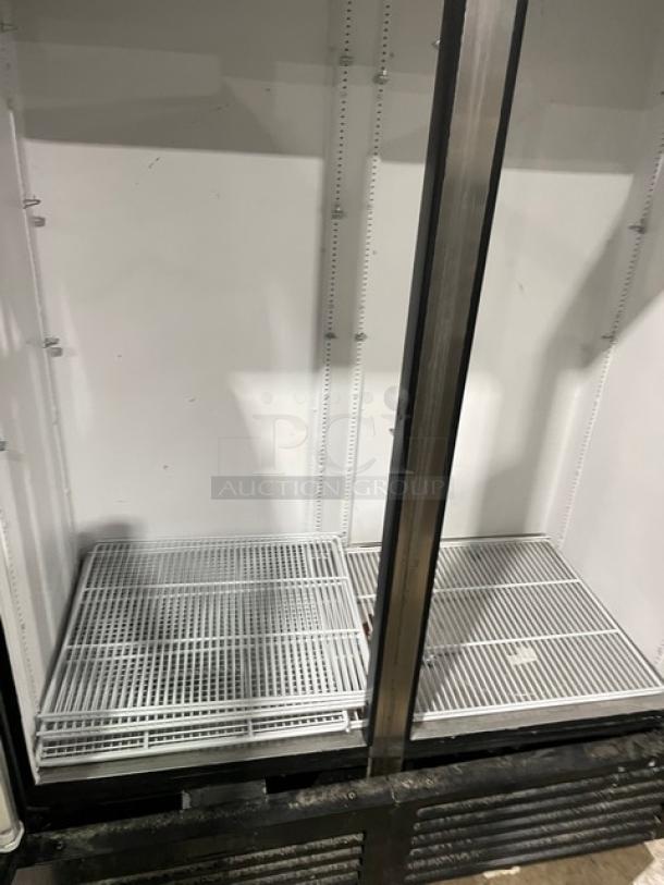 True GDM-49 black double glass swing door merchandiser refrigerator with poly-coated wired rack, model GDM-49, SN: 4983421, 115V 1 Phase.
