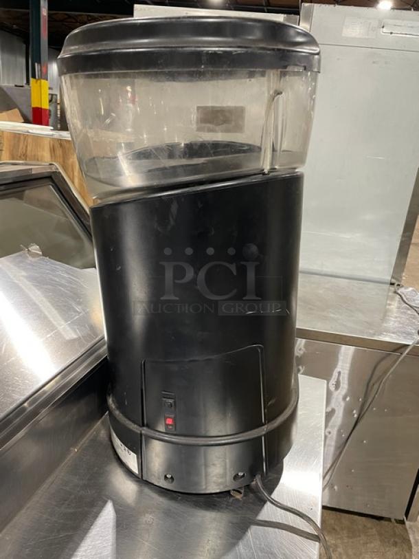 Vita-Mix VM0126 Commercial Blender, clear polycarbonate container, double insulated hopper, 120V, black, on legs.