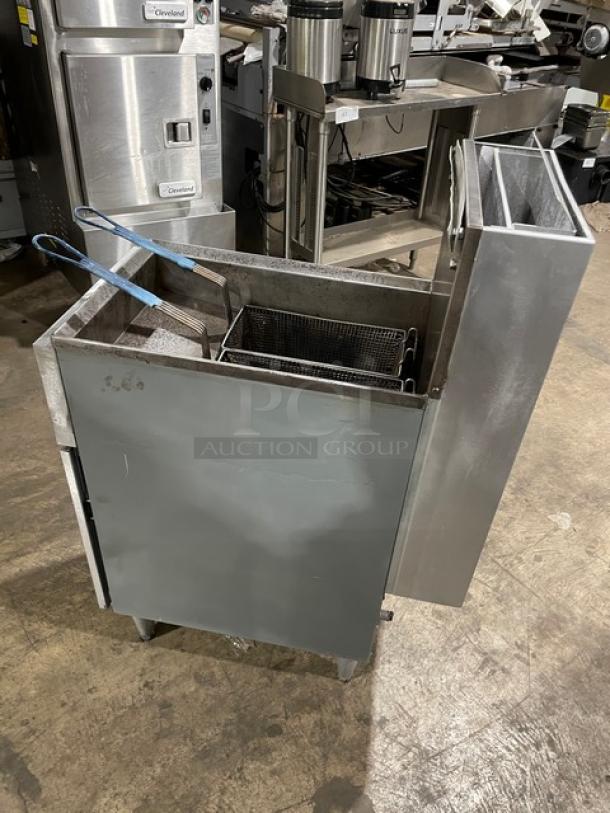 Cecilware FMP40 stainless steel natural gas deep fryer, 43 lb. capacity, with back splash and fry basket, on legs.