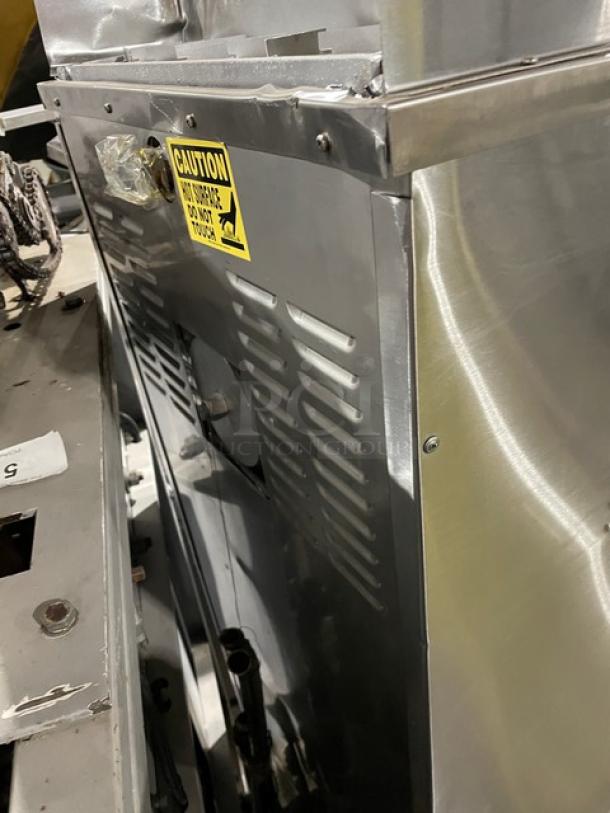 Cleveland Range 24CGP10 SteamCraft Power-10 commercial steamer, stainless steel, dual compartments, visible caution label.