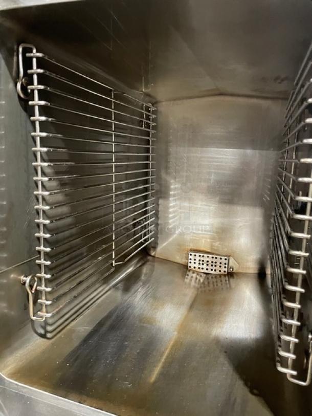 Cleveland Range SteamCraft Power-10 dual compartment convection steamer interior with pan holding racks, stainless steel, model 24CGP10.