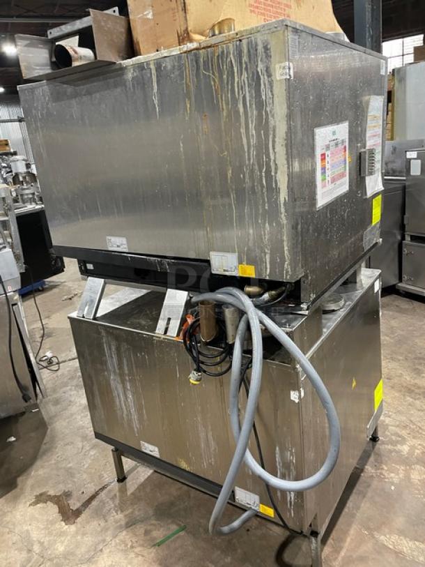 Rational iCombi Pro stainless steel double-stacked combi oven, model LM100CG.AXXXX, with wired oven rack, on legs.