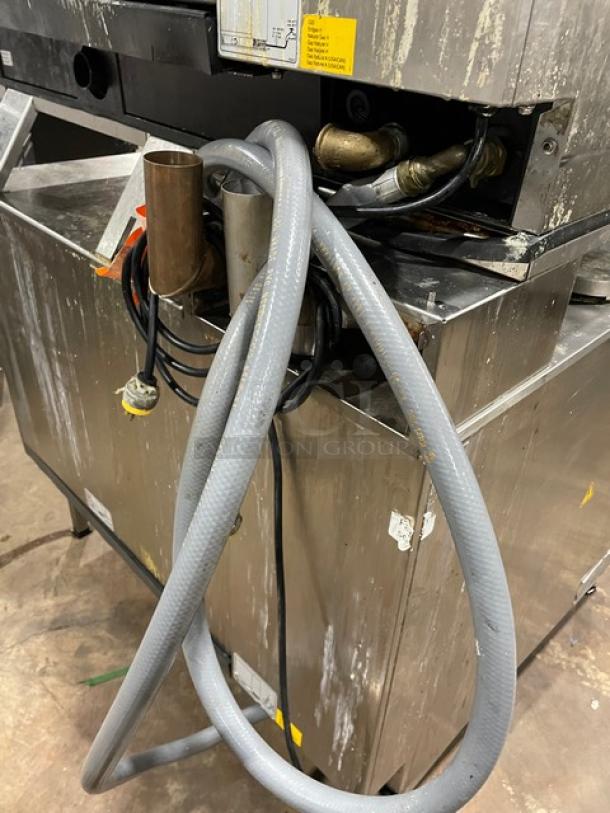 Rational iCombi Pro Stainless Steel Double Stacked Combi Oven, Model LM100CGAXXXX, with wired rack. Natural gas, 208/240V, on legs.