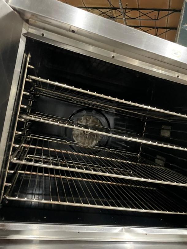 Blodgett stainless steel double stacked convection oven, Energy Star certified, with thermostatic control and wired racks.