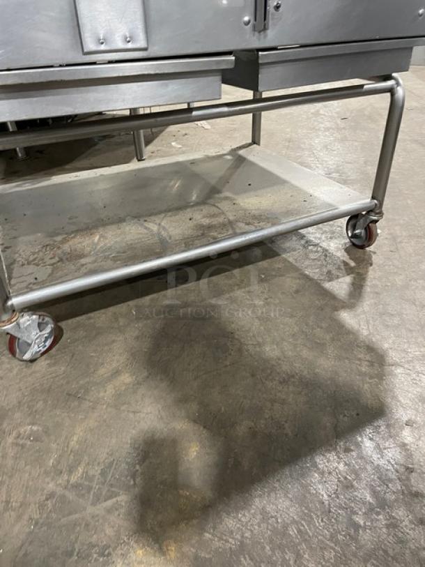 WoodStone 48" stainless steel natural gas plancha griddle with back and side splash, undershelf cart on casters.