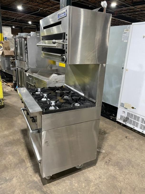 Sunfire by Garland stainless steel 6-burner range/oven with U.S. Range salamander. Model SX-6-26 on casters, wired racks.