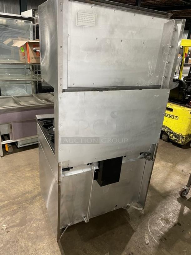 Sunfire Garland stainless steel 6-burner range/oven combo with U.S. Range salamander broiler. Model SX626, on casters.