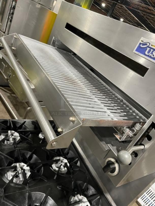 Sunfire by Garland stainless steel 6 burner range/oven with U.S. Range salamander broiler. Model SX-6-26 on casters.