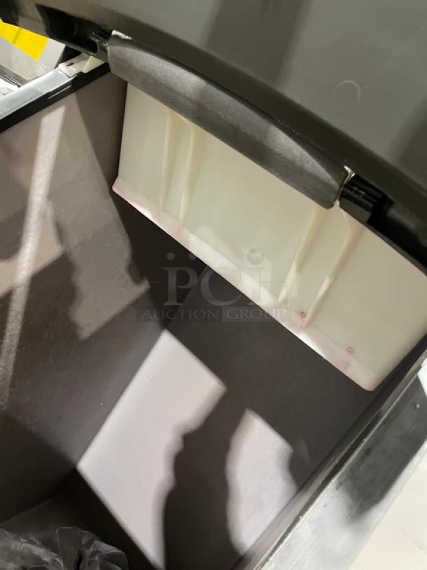 Manitowoc IY0524A-161 stainless steel ice machine interior, showing ice bin. Model: IY0524A161, Serial: 1120313247.
