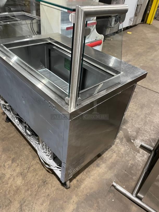 Atosa MSF8306 stainless steel 2-door prep table with sneeze guard and poly coated rack, on casters, 115V.