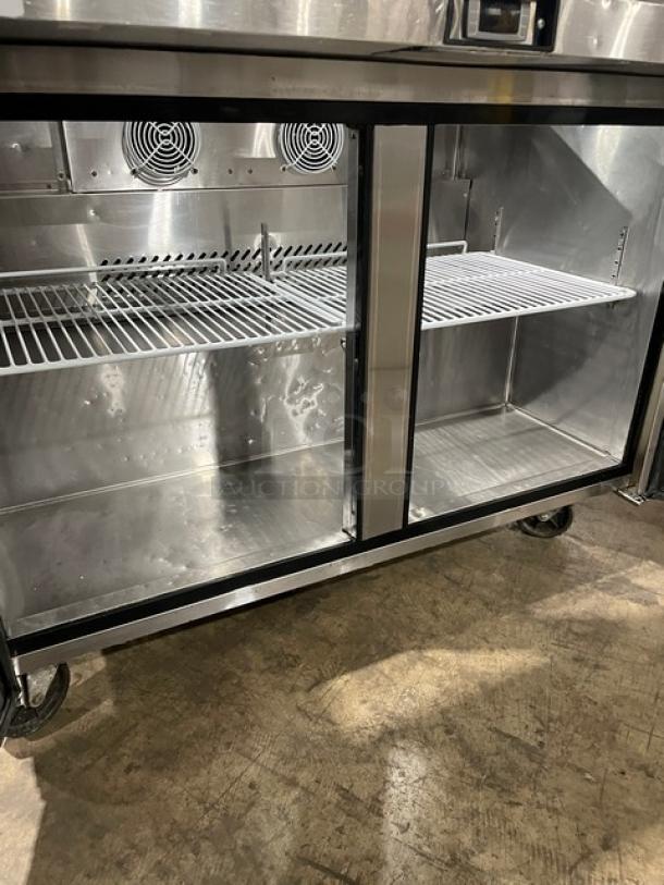 Atosa MSF8306 stainless steel 2-door refrigerated prep table with sneeze guard, poly coated wired rack, on casters, 115V.