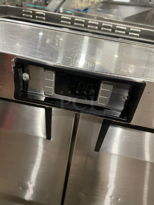 Atosa MSF8306 stainless steel 2-door refrigerated prep table with digital display, sneeze guard, and poly-coated rack.