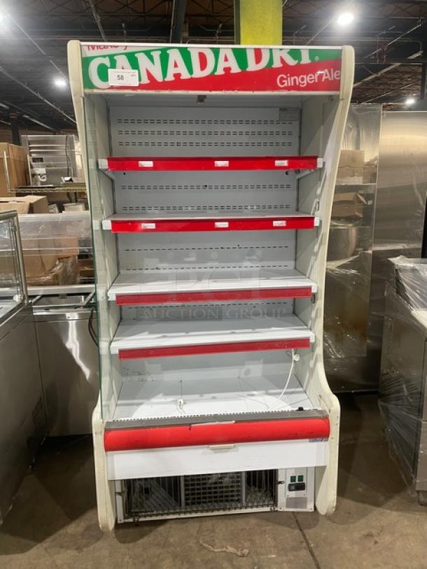 Igloo Canada Dry style commercial refrigerated display case, white with red accents, multi-tier shelves, 115V.