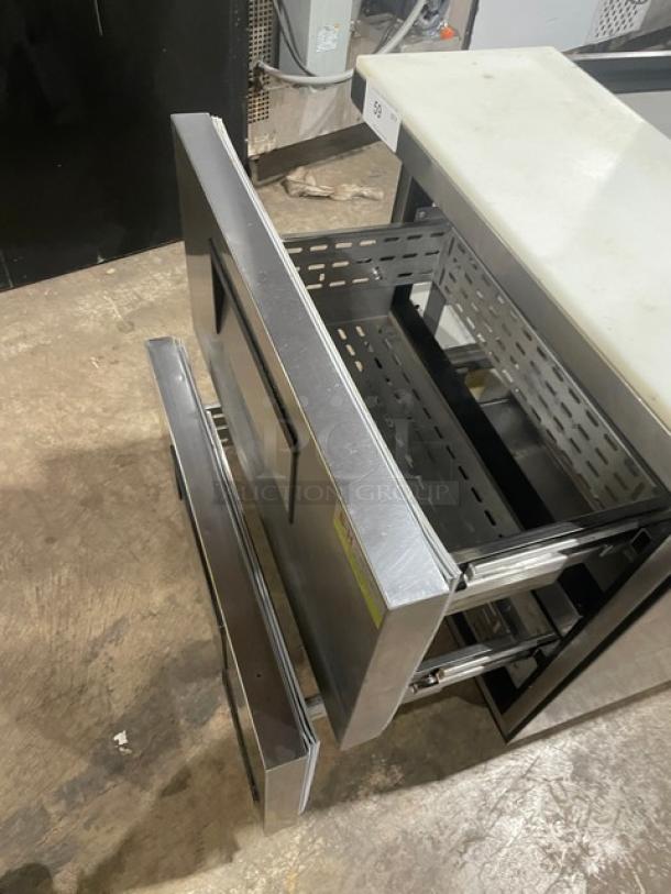 True TSSU-27-08D-2 stainless steel bain marie prep table with 2 refrigerated drawers, cutting board, on casters, 115V.