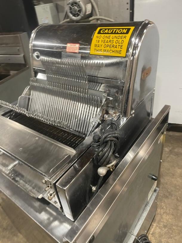 Berkel MB Commercial Bread Slicer, stainless steel, electric, countertop model, SN: 9211120103897, on legs, 115V 1 Phase. Warning labels visible.