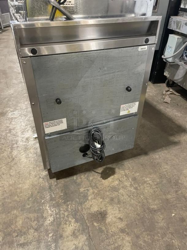 True Commercial Stainless Steel 2 Drawer Refrigerator, Model TWT-27D-2-HC, with upturned backsplash and visible wiring.