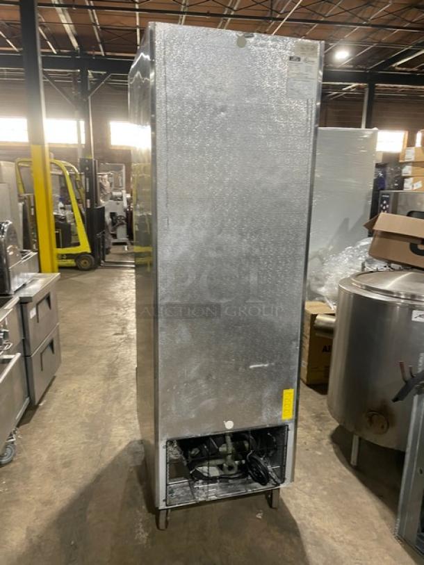 Arctic Air AR23E stainless steel single door refrigerator, Energy Star certified, poly-coated rack, 115V, on casters.