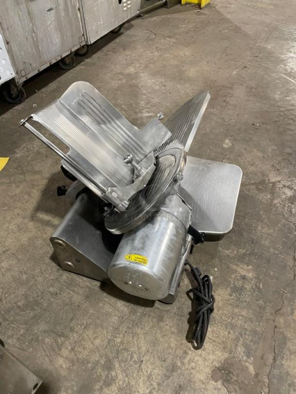 Globe 500L commercial electric meat slicer, heavy-duty, countertop model on legs, visible power cord, SN: 882440.