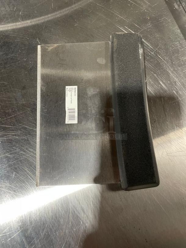 Brand new Winco DSC-2 stainless steel dough scraper with black grip handle, visible barcode label.