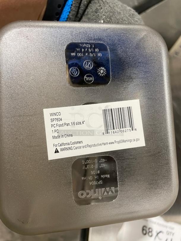 Brand new Winco SP7604 1/6-size 4" deep clear polycarbonate food pan. Label indicates size and model; made in China.