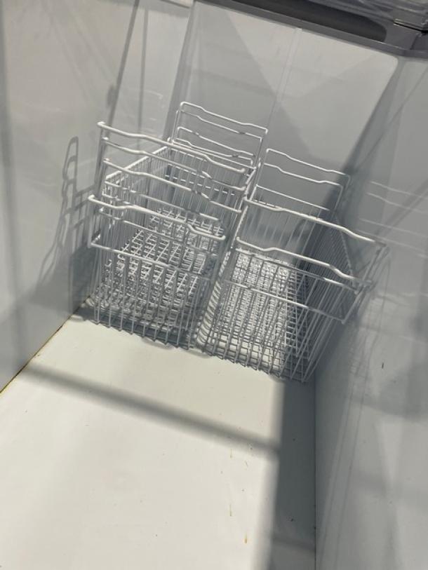 Avantco 70" flat-top ice cream freezer interior with poly-coated wire basket, model 360DFF20HCL, excellent condition.