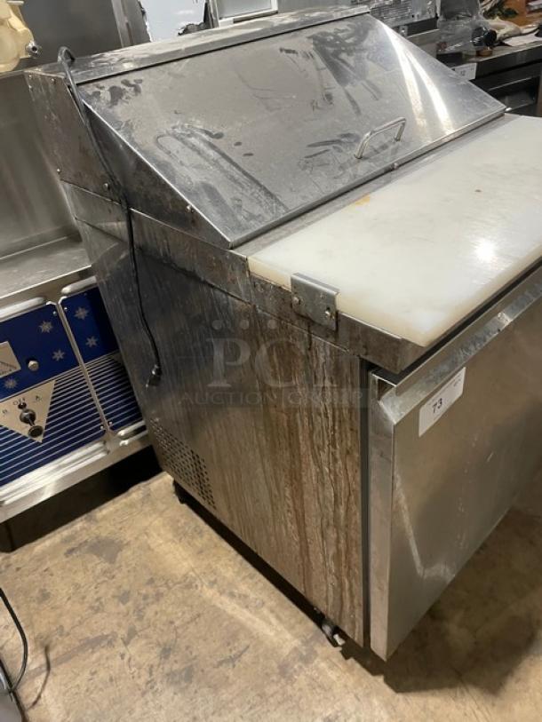 Avantco SCL1 stainless steel refrigerated prep table with cutting board, pans, and poly-coated rack on casters. Model 178SCL1.