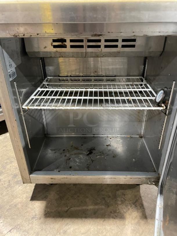 Avantco SCL Series refrigerated prep table, Model 178SCL1, stainless steel, single door, poly-coated rack, on casters.