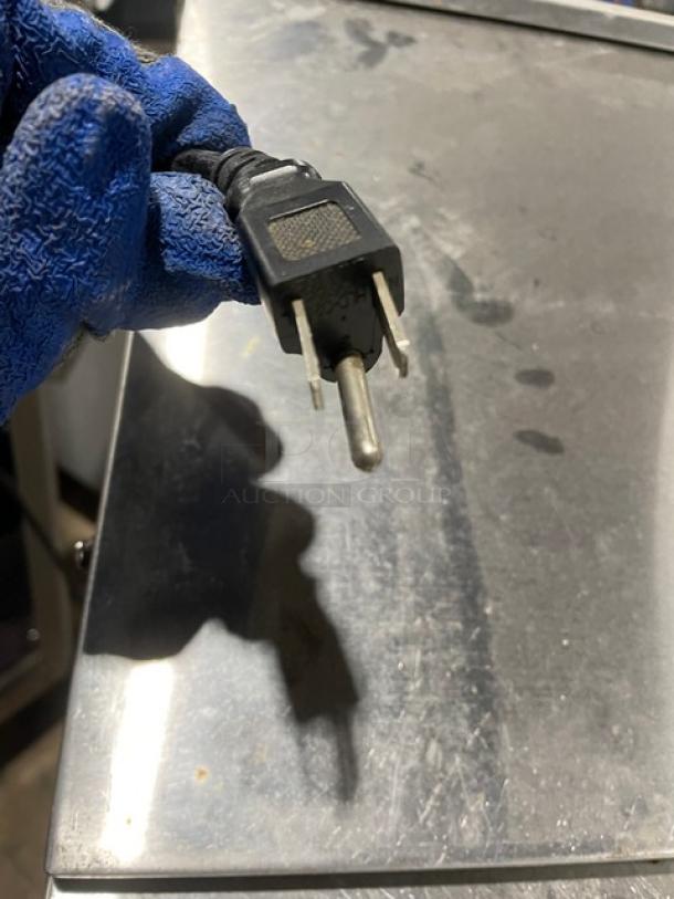 Power plug for Avantco SCL Series refrigerated prep table, Model 178SCL1, 115V, shown on a stainless steel surface.
