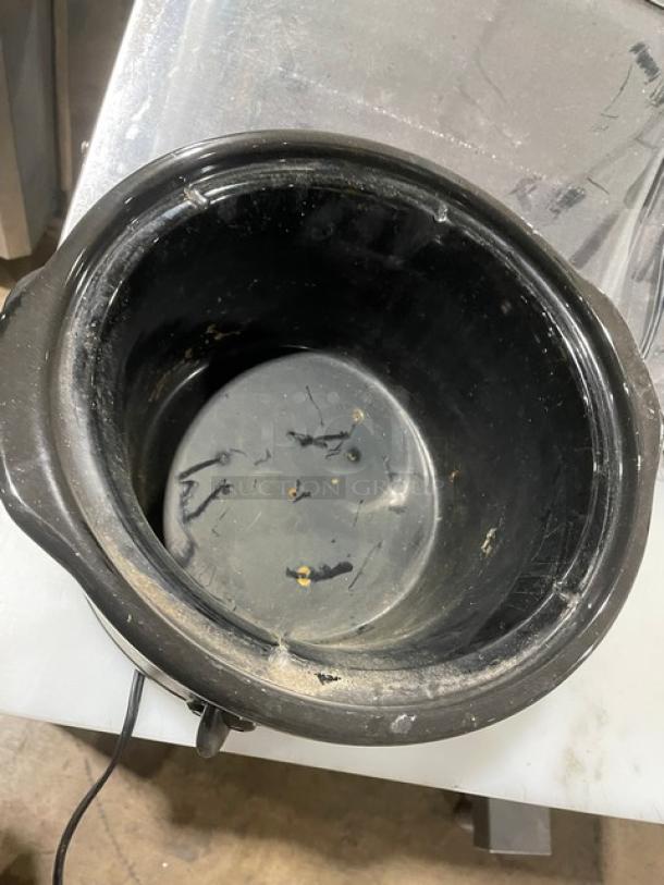 Crock-Pot Rival SCR503 5 Qt round slow cooker. Stainless steel, electric, countertop model with handles and lid. Used condition.