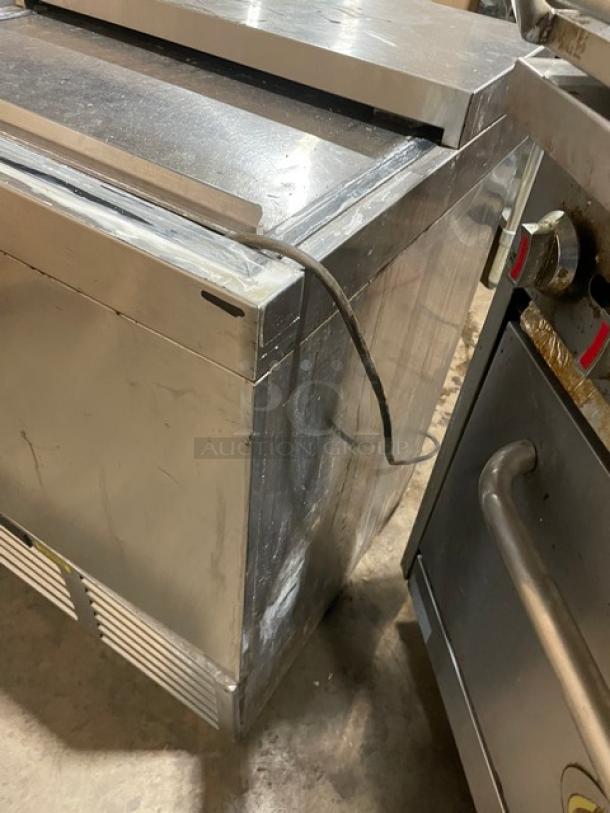 Krowne MC24S stainless steel 24" underbar glass/mug froster, sliding top lid, used condition, SN: 0101590, 115V, 1 Phase.