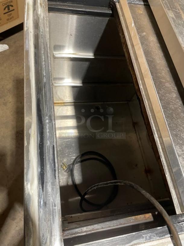 Krowne 2016 stainless steel 24" underbar glass/mug froster, sliding-top lid, Model MC24S, SN 0101590, 115V 1 Phase, used.