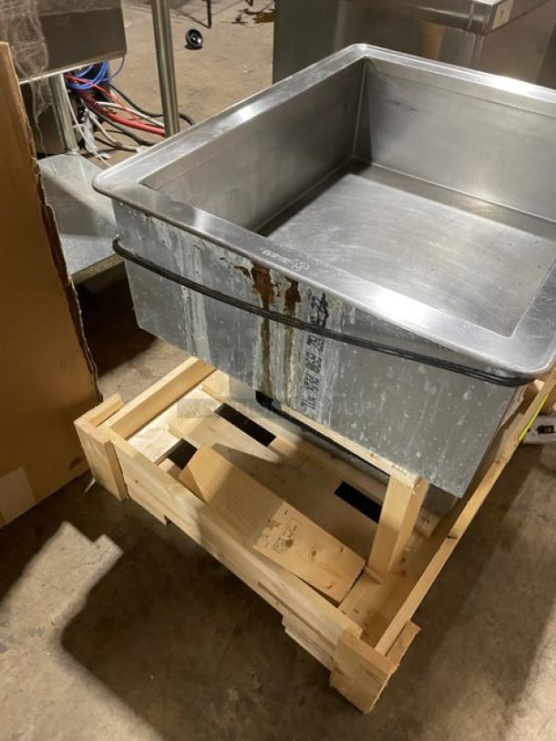 Atlas Metal stainless steel refrigerated drop-in cold unit on wooden pallet. Single well with visible wear and electric power setup.