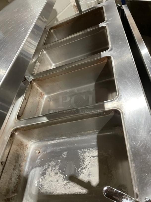 Piper Products stainless steel 4-well heated buffet counter, Model 4HF, with sneeze guard, tray slides, and dry shelf base.