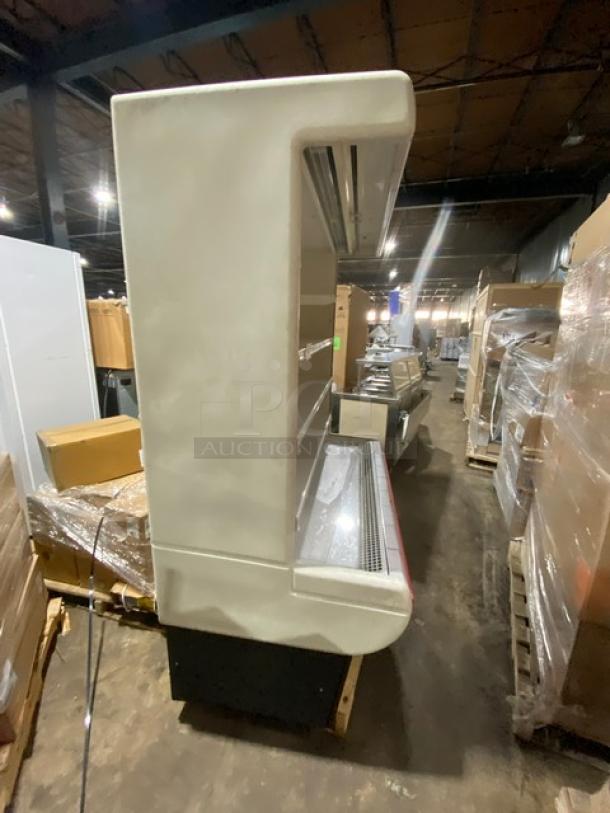 Hussmann MD14 refrigerated open merchandiser with multi-tier shelving, pull-down night curtain, model MY09N055552, 208-230V.