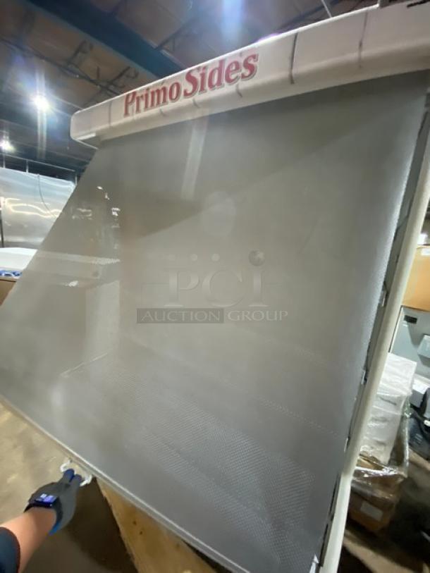 Hussmann MD14 refrigerated display case with pull-down night curtain. Features Primo Sides branding. 208-230V.