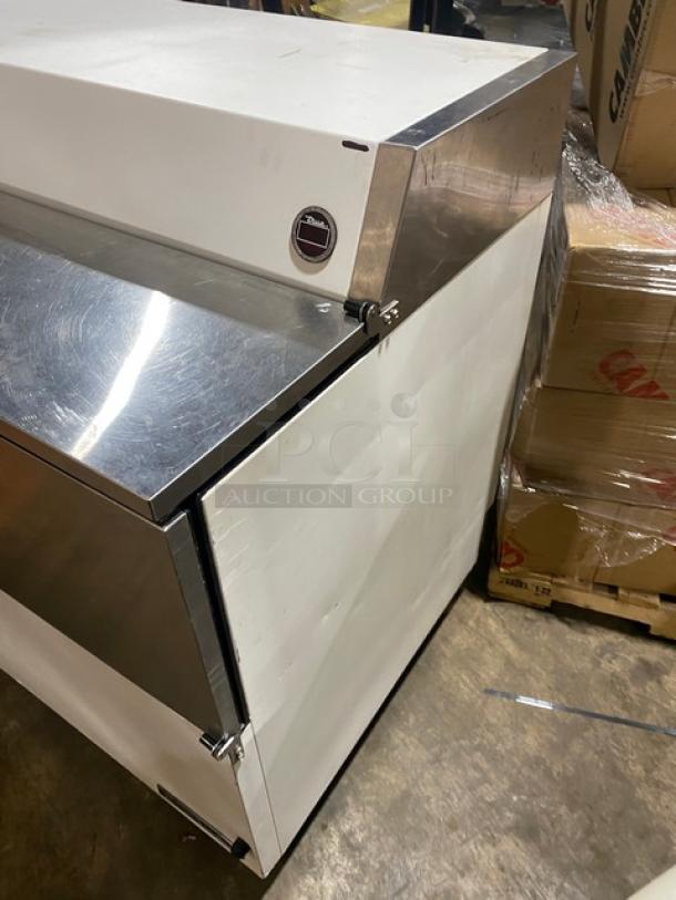 True TMC58 commercial milk cooler, white/stainless steel, with poly-coated rack. Model TMC-58, SN 4895573, 115V, 1 Phase.