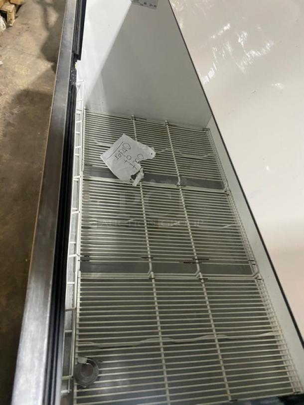 True TMC-58 white/stainless steel milk cooler with poly coated rack, model TMC58, SN: 4895573, 115V, 1 Phase.