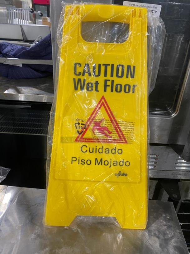 Brand new Update International 24" yellow wet floor sign, model WFS25, with caution text in English and Spanish.