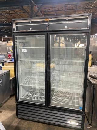True Commercial Black Double Glass Swing Door Reach In Merchandiser Freezer! Energy Star Certified! With Poly Coated Wired Rack! Model: GDM-49F-LD SN: 8006250! 115/208-230V 1 Phase! On Casters! - Item #1215585