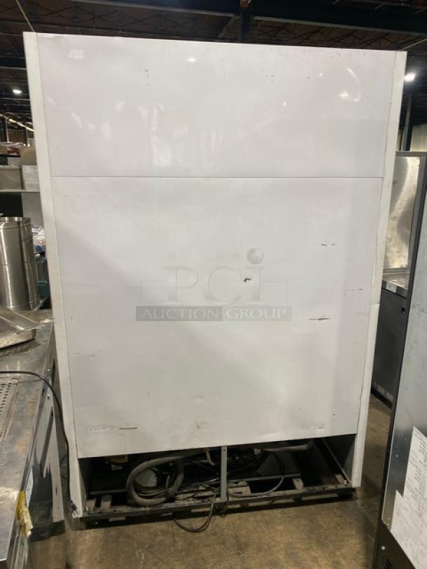 True GDM-49F-LD commercial freezer with double glass swing doors, poly-coated racks, and casters. Energy Star certified.