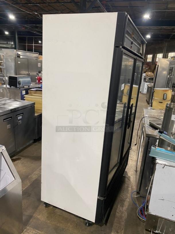 True GDM49FLD double glass door freezer, Energy Star, poly coated racks, on casters, model SN: 8006250, 115/208-230V.